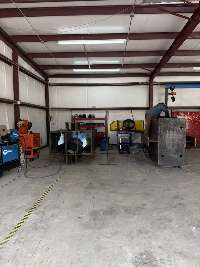 Inside the TG Welding shop bay on Highway 183