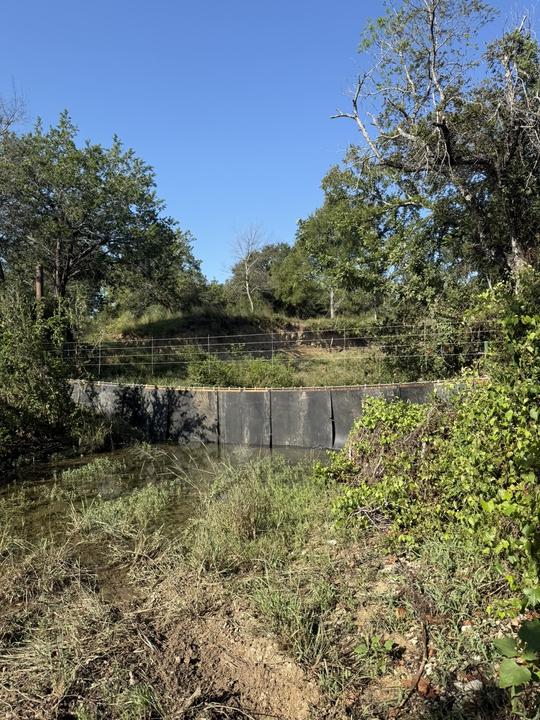 Hanging water gap across a creek crossing