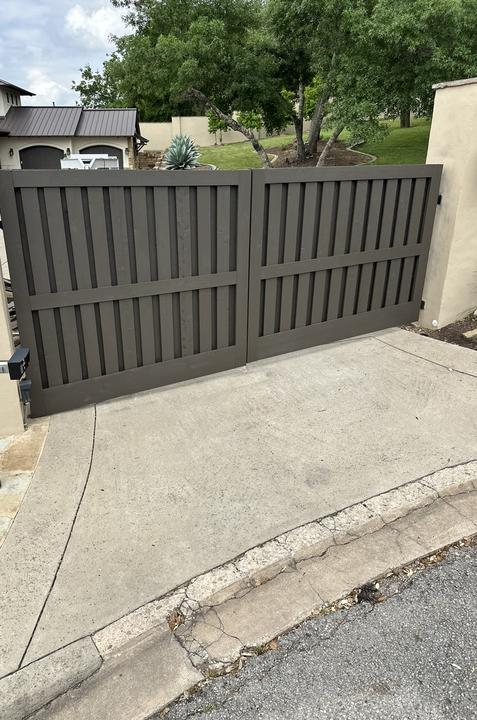 Automated double swing gate with steel frame