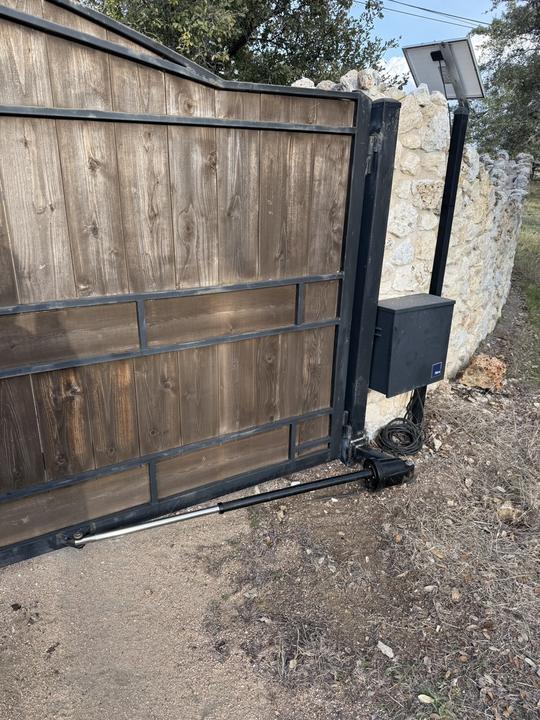 Wood and steel swing gate with automatic opener