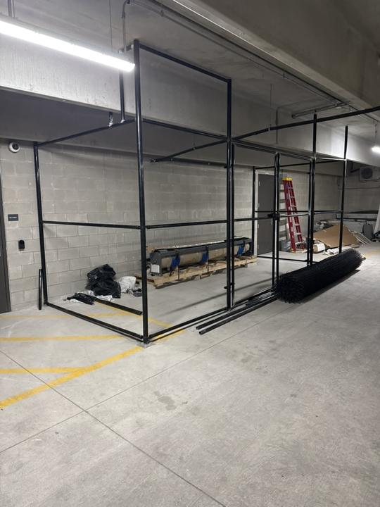 Steel enclosure frame going up in a parking garage