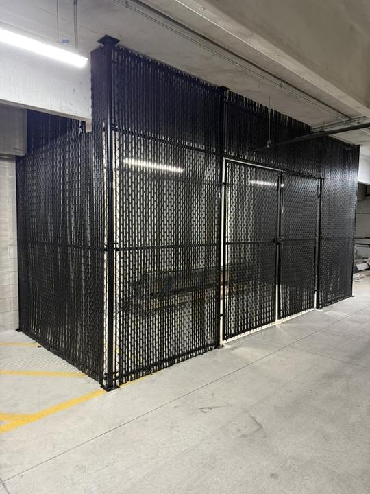 Chain link storage enclosure with privacy slats