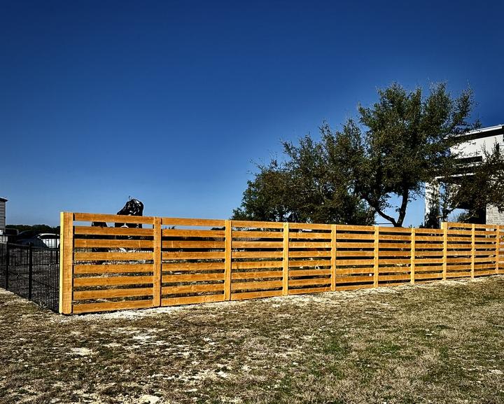 Horizontal cedar privacy fence, finished run