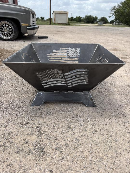 Plasma cut flag fire pit on a steel base