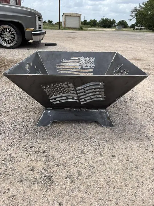 Plasma cut flag fire pit on a steel base