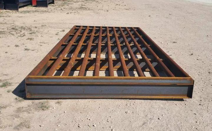 End view, pipe rails welded on a channel frame