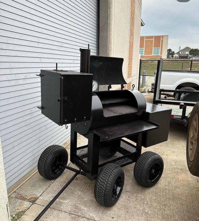 Offset smoker on a four wheel cart