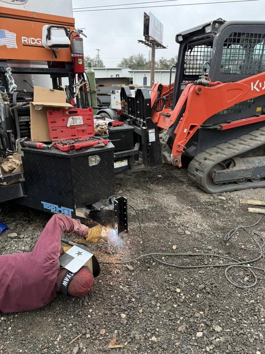 Welding a trailer hitch on site