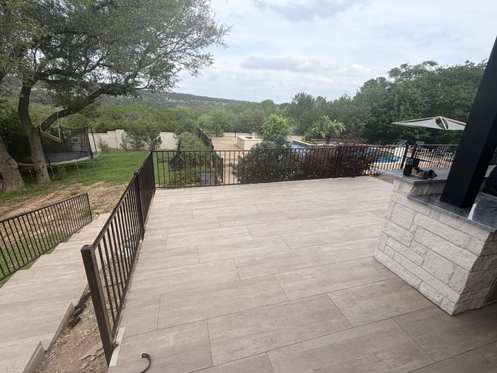 Picket rail around patio and pool terrace