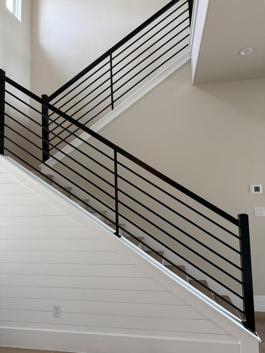 Two-flight horizontal bar stair rail