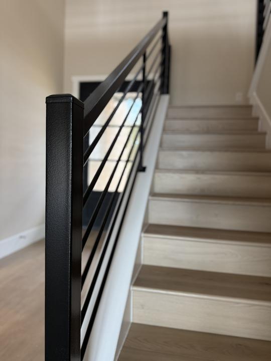 Powder coated newel post and horizontal bar stair rail