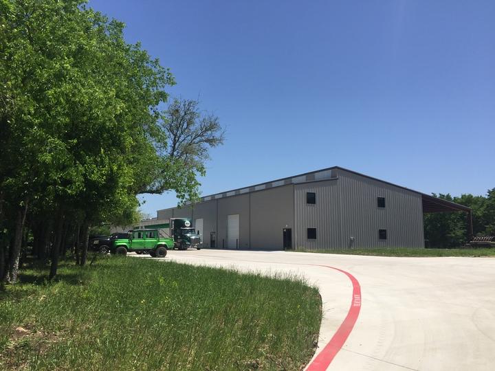 Large commercial steel building with lean-to