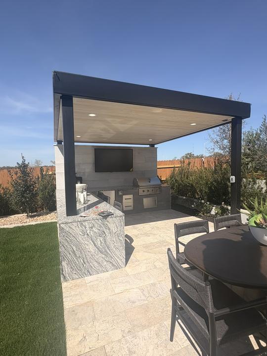 Covered outdoor kitchen with a steel frame