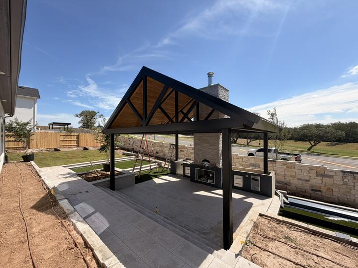 Gable pavilion set over a sunken patio